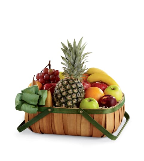 The FTD® Thoughtful Gesture™ Fruit Basket. An arrangement by Country Cousins Flower Shop.