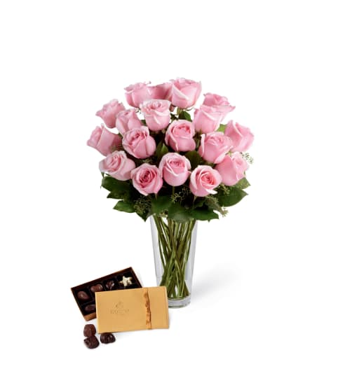 The FTD® Pink Rose and Godiva® Bouquet. An arrangement by Country Cousins Flower Shop.