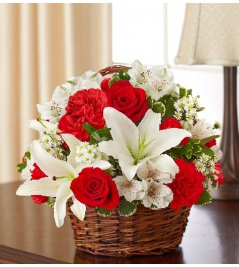 Peace, Prayers and Blessings - Red and White. An arrangement by Graceland Florist.