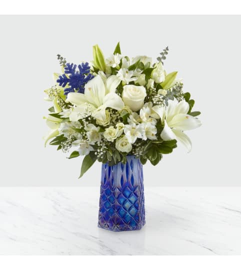 Winter Bliss™ Bouquet. An arrangement by Country Cousins Flower Shop.