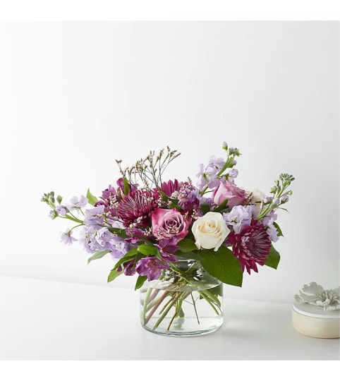 Periwinkle Breeze Bouquet™ by FTD®. An arrangement by Country Cousins Flower Shop.