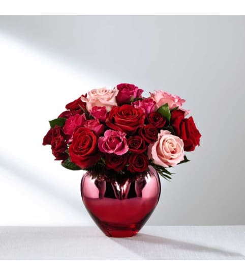 The FTD® Hold Me in Your Heart™ Rose Bouquet 2017. An arrangement by Country Cousins Flower Shop.