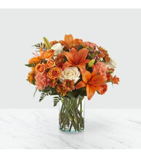 The FTD Falling for Autumn™ Bouquet. An arrangement by Country Cousins Flower Shop.