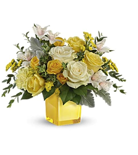 Teleflora's Sweet Sunlight Bouquet. An arrangement by Flowers and Pine World.