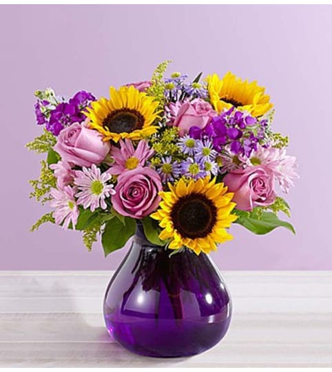 Floral Devotion™. An arrangement by Graceland Florist.