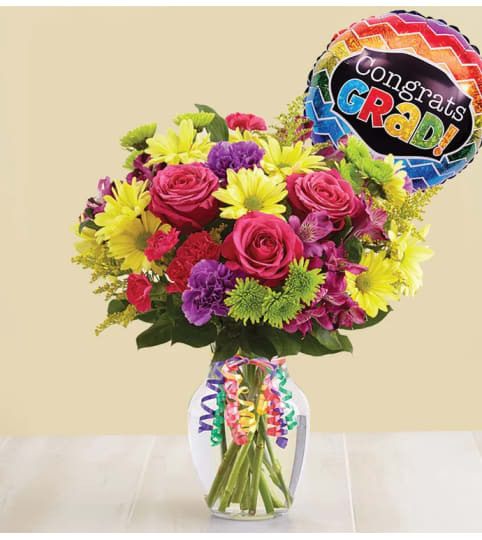 It’s Your Day Bouquet® Graduation. An arrangement by Lovingly Charlotte.
