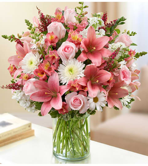 Sincerest Sorrow - Pink and White. An arrangement by Graceland Florist.