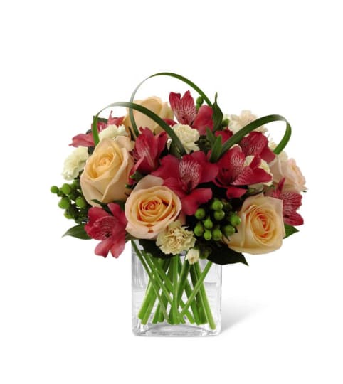 The FTD® All Aglow™ Bouquet. An arrangement by Country Cousins Flower Shop.