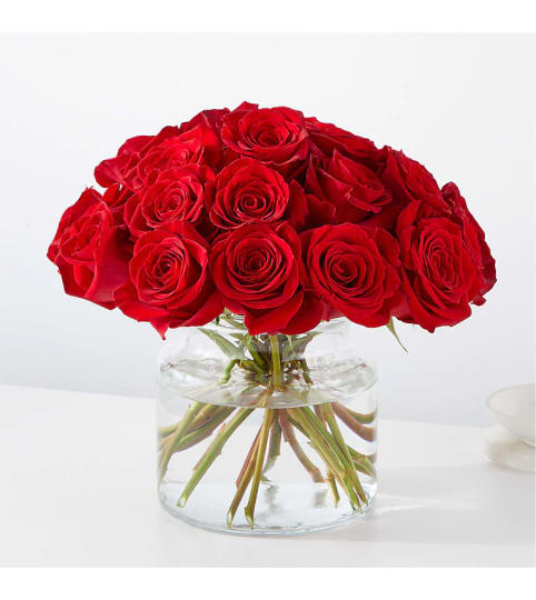 Cupid's Embrace Red Rose Bouquet. An arrangement by Country Cousins Flower Shop.