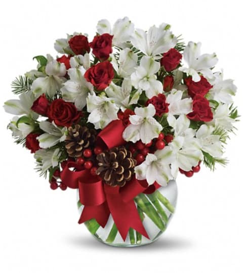 Let It Snow. An arrangement by Florist of the Northwoods.