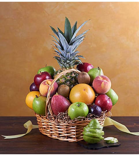 Deluxe All Fruit Basket for Sympathy. An arrangement by Graceland Florist.