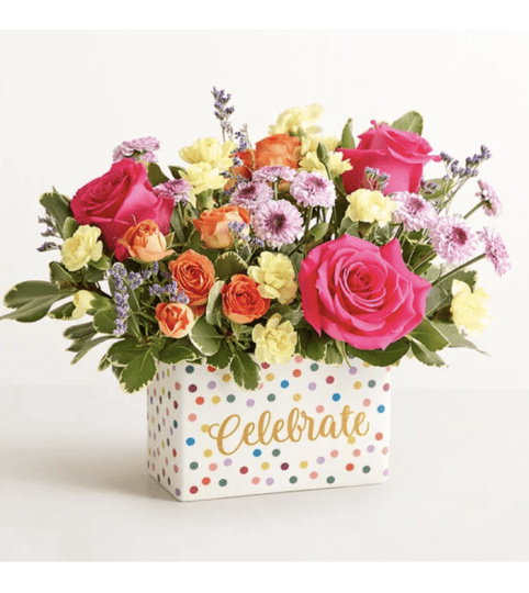 Celebrate The Day Flower Bouquet™. An arrangement by Lovingly Charlotte.