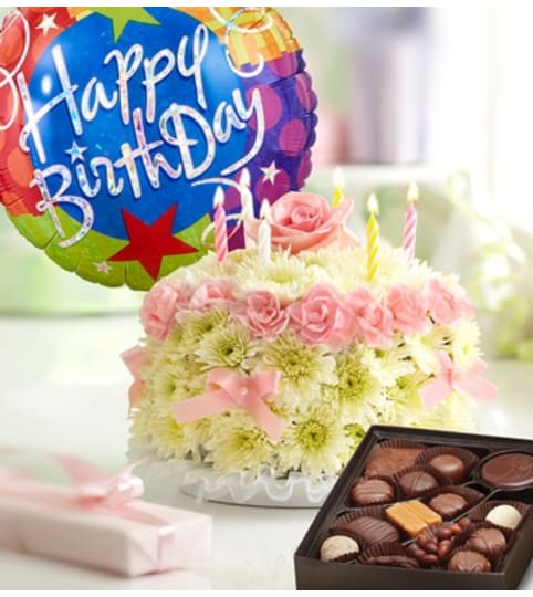 Birthday Flower Cake® Pastel. An arrangement by Susana's Flowers.