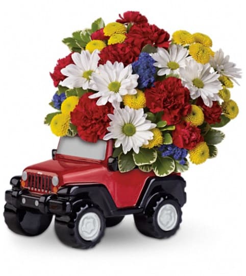 Jeep® Wrangler Blazing Trails Bouquet by Teleflora. An arrangement by Devine Orchid.