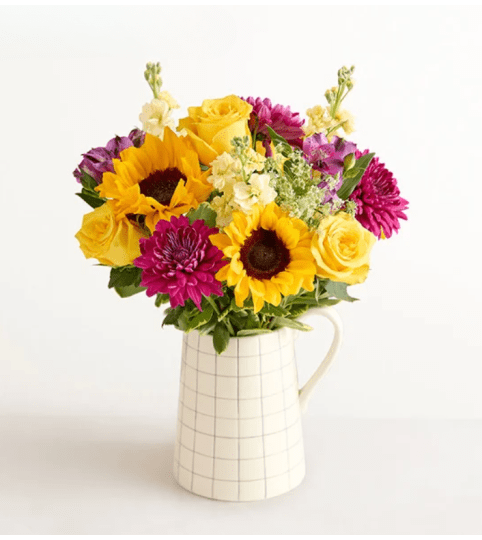 Golden Violet Harmony™ Bouquet. An arrangement by Sicola's Florist.