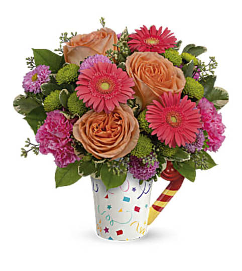 Teleflora’s Time To Celebrate Bouquet. An arrangement by Margaret's Florist.