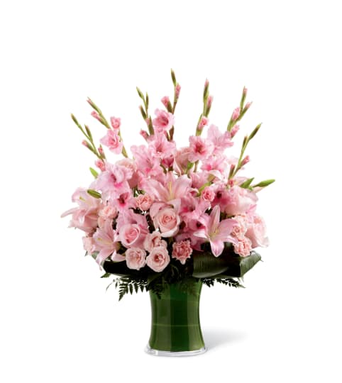 The FTD® Lovely Tribute™ Bouquet. An arrangement by Country Cousins Flower Shop.