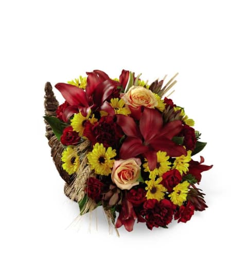 The FTD® Fall Harvest™ Cornucopia by Better Homes and Gardens 15. An arrangement by Country Cousins Flower Shop.