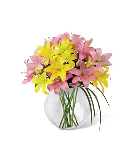 The FTD® Lilies and More™ Bouquet. An arrangement by Country Cousins Flower Shop.