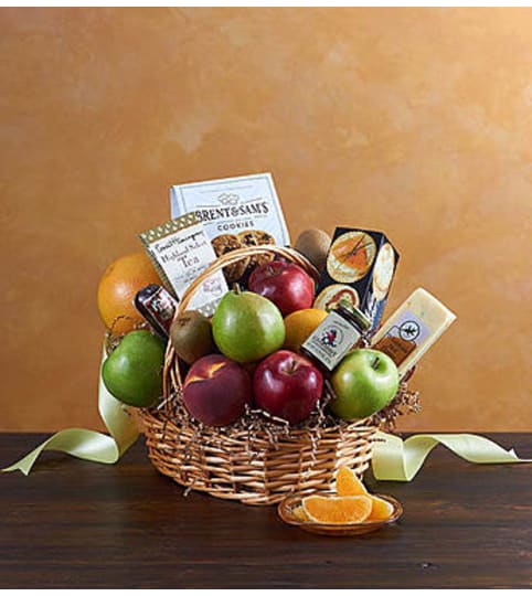 Deluxe Fruit and Gourmet Basket for Sympathy. An arrangement by Graceland Florist.