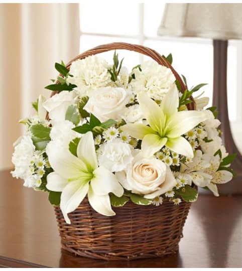 Peace, Prayers and Blessings - All White. An arrangement by Graceland Florist.