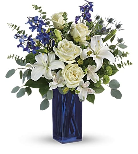 Teleflora's Calming Cobalt Bouquet. An arrangement by Pompano Beach Floral.