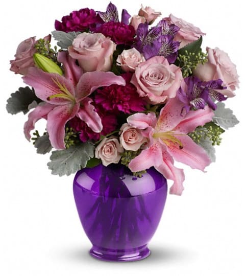 Teleflora's Elegant Beauty. An arrangement by Maezy's Petals.