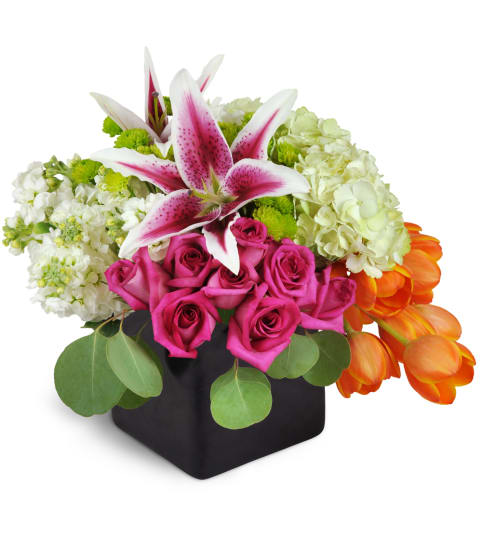 Vibrant Delight™. An arrangement by Blooming Hills Florist.