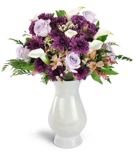 She's Enchanting™ Bouquet. An arrangement by Strawberry Fields Flowers and Gifts.