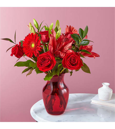 Burnin' Love Bouquet by FTD. An arrangement by Country Cousins Flower Shop.