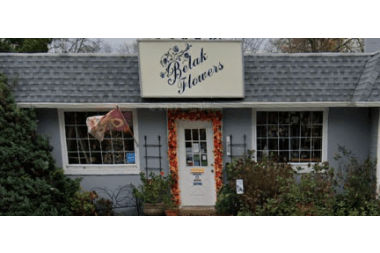 Belak Flowers florist arranging flowers