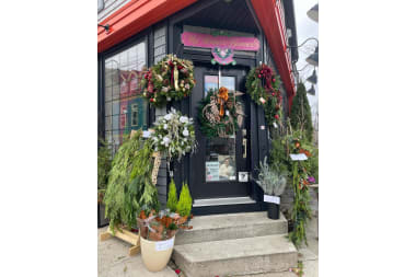 My Mother's Bloomers florist arranging flowers