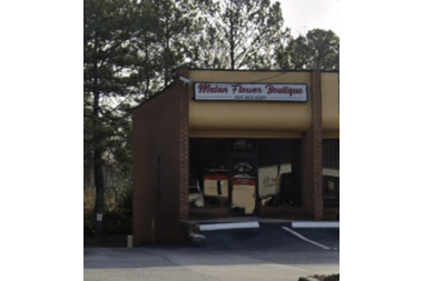 Malan Flower Boutique florist arranging flowers