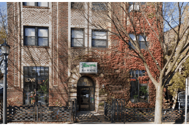 Flowers By Miss Bertha florist arranging flowers