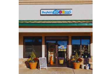 Bayfield Blooms florist arranging flowers