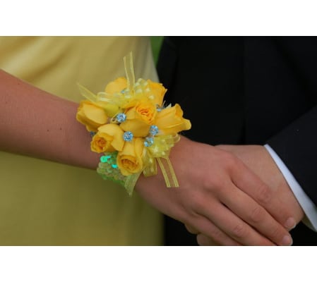 WRIST CORSAGE OF YELLOW ROSES