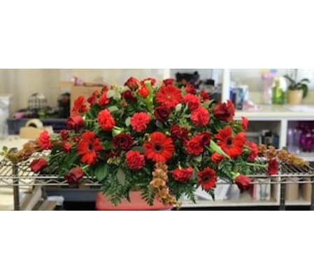 Red Is The Name Casket Spray