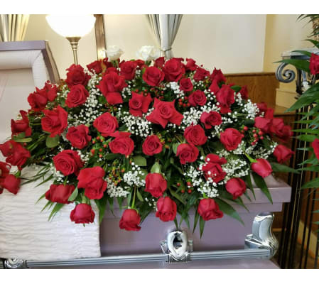 Red roses casket spray