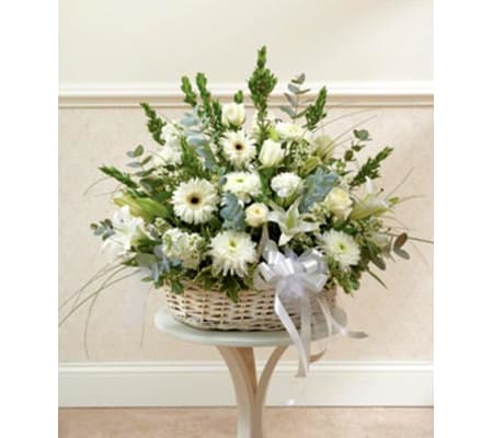 Three-Sided Arrangement of Assorted white Flowers in Low basket