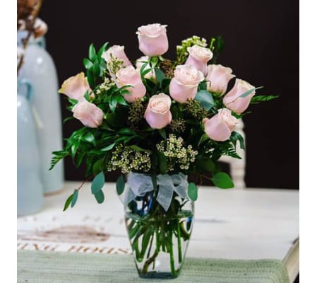 12 Premium pink roses in a vase