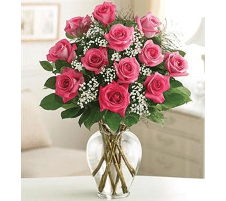 1 DOZEN PINK ROSES IN VASE WITH GREENS AND FILLER