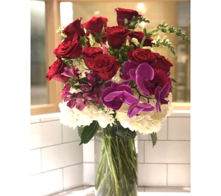 Elevated Dozen Roses Florals