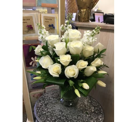 Special white flowers in vase by Vivian