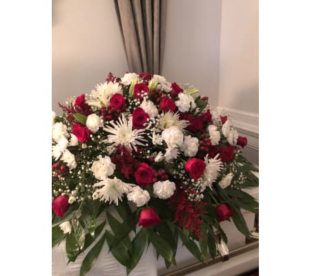 A Traditional Red and white half couch spray