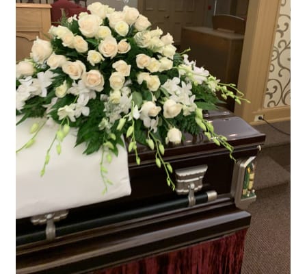 All WHITE roses and orchids Casket Spray