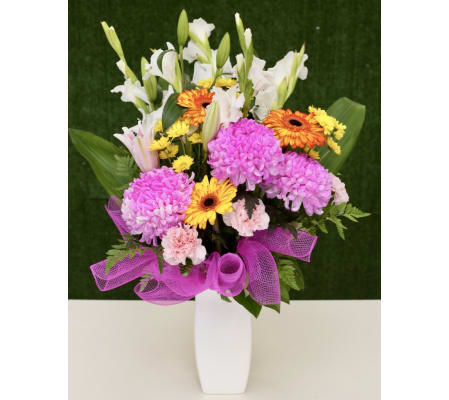 Vivid Floral Arrangement in a Ceramic Vase
