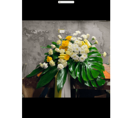 Yellow Bliss Casket Spray