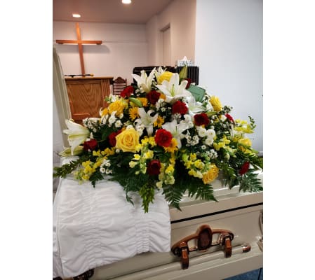 Lily and Sunshine casket Spray