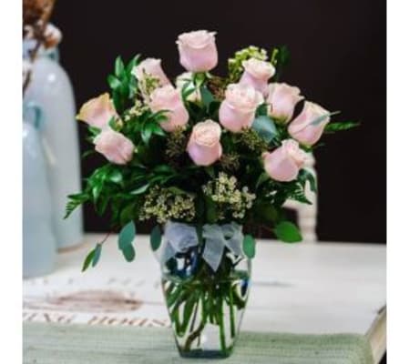 12 Premium pink roses in a vase