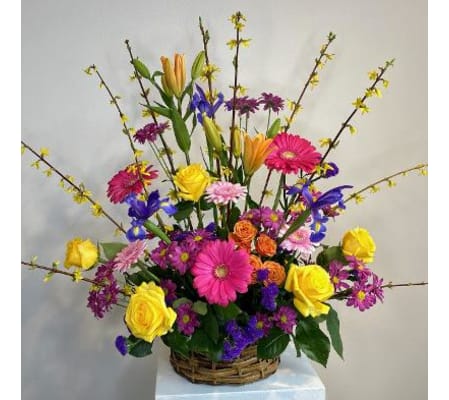 Basket of bright colorful flowers